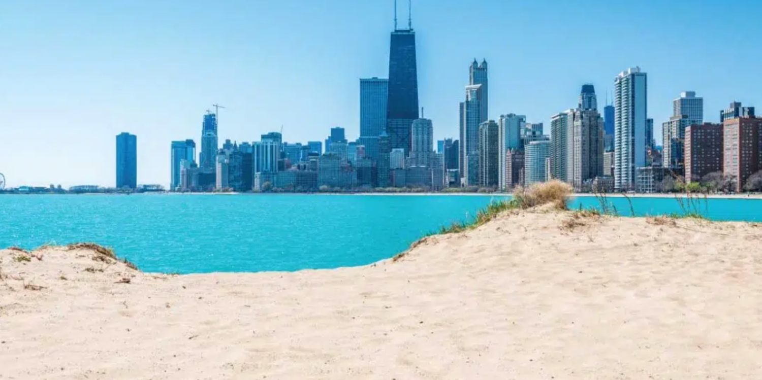 an image of the Chicago skyline plus a sandy Chicago beach