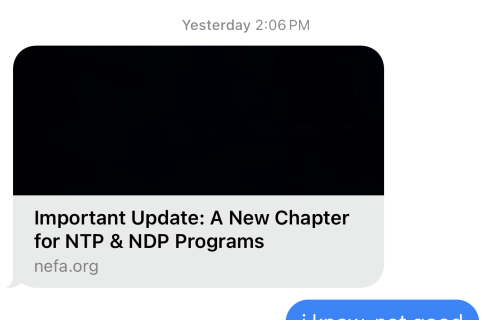 a text message shares the news from NEFA with a black void