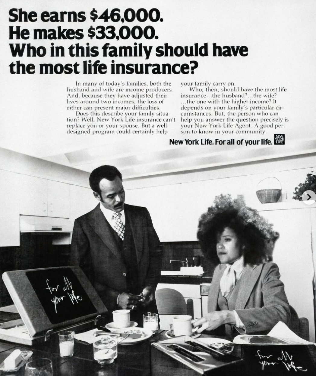 a Black man and woman are sitting at a kitchen table, with a briefcase that says 'for all your life'